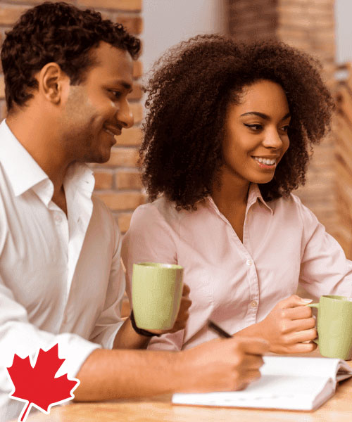 Attractive Afro-American couple working
